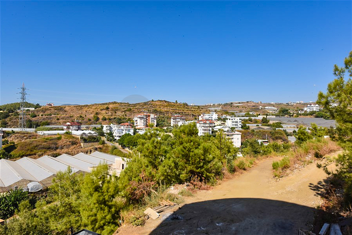 شقة 1+1 في منطقة كوناكلي في مجمع قيد الإنشاء