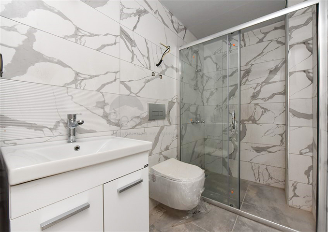 شقة 1+1 في مبنى جديد في منطقة محمودلار شقة 1+1 في مبنى جديد في منطقة محمودلار