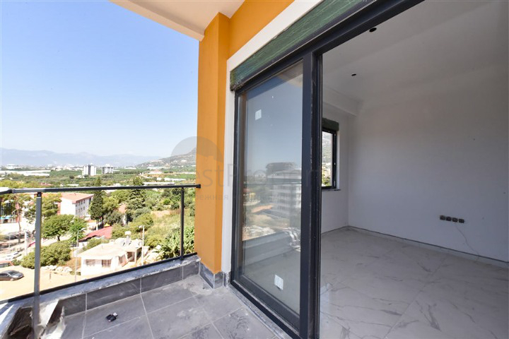 شقة 1+1 في مبنى جديد في منطقة محمودلار شقة 1+1 في مبنى جديد في منطقة محمودلار