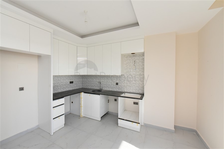 2 + 1 بنتهاوس في منزل جديد 400 متر من البحر  2 + 1 بنتهاوس في منزل جديد 400 متر من البحر