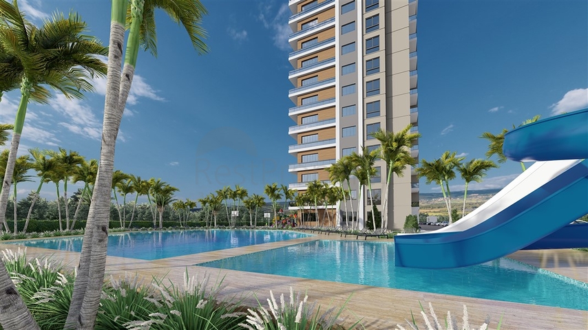 شقق في مجمع قيد الإنشاء مع بنية تحتية غنية في منطقة إردملي