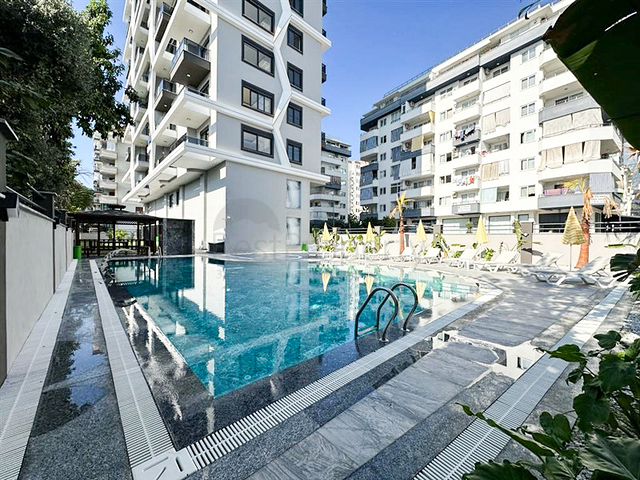 شقة 1+1 في مجمع سكني جديد في منطقة محمودلار شقة 1+1 في مجمع سكني جديد في منطقة محمودلار