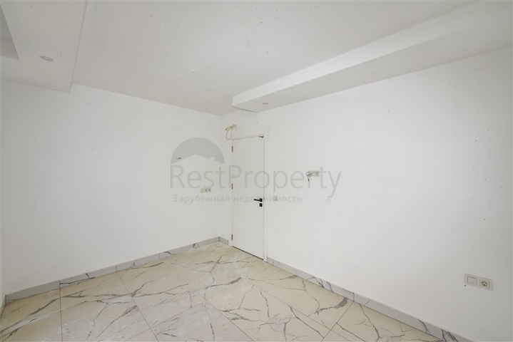 شقة 1+1 مطلة على الجبل والبحر في منطقة محمودلار شقة 1+1 مطلة على الجبل والبحر في منطقة محمودلار