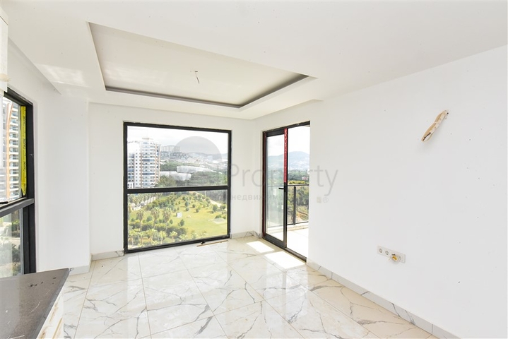 شقة 1+1 مطلة على الجبل والبحر في منطقة محمودلار شقة 1+1 مطلة على الجبل والبحر في منطقة محمودلار