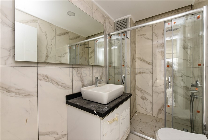 شقة 1+1 مطلة على الجبل والبحر في منطقة محمودلار شقة 1+1 مطلة على الجبل والبحر في منطقة محمودلار