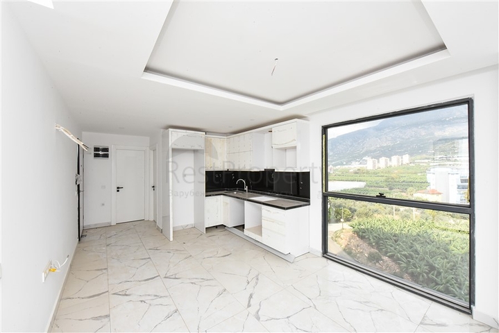 شقة 1+1 مطلة على الجبل والبحر في منطقة محمودلار شقة 1+1 مطلة على الجبل والبحر في منطقة محمودلار