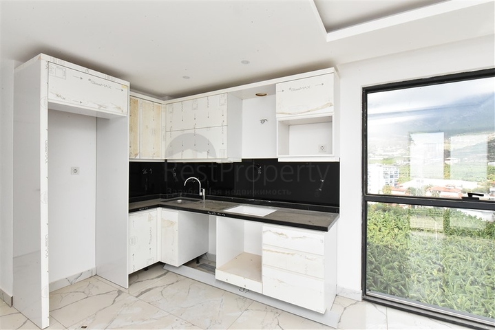 شقة 1+1 مطلة على الجبل والبحر في منطقة محمودلار شقة 1+1 مطلة على الجبل والبحر في منطقة محمودلار