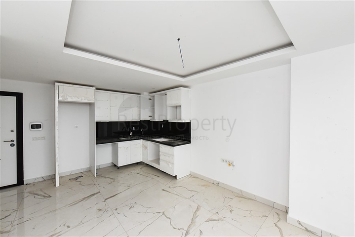 شقة 1+1 في مبنى جديد في منطقة محمودلار شقة 1+1 في مبنى جديد في منطقة محمودلار