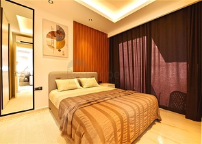 شقة 1+1 على الخط الأول في محمودلار في مجمع سكني مرموق