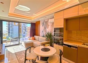 شقة 1+1 على الخط الأول في محمودلار في مجمع سكني مرموق