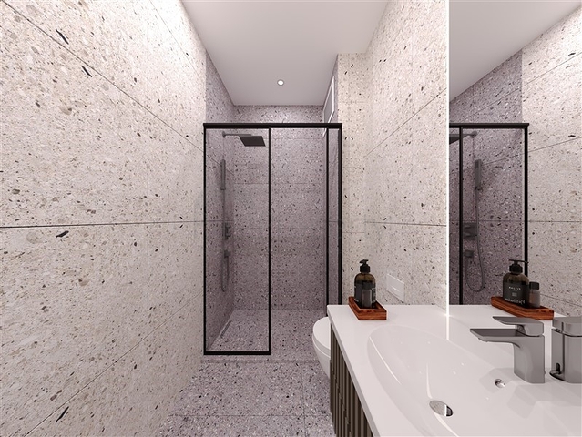 مجمع سكني في المرحلة النهائية من البناء في حي تيجي