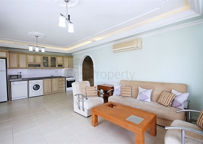 شقة 2 + 1 350 م من البحر