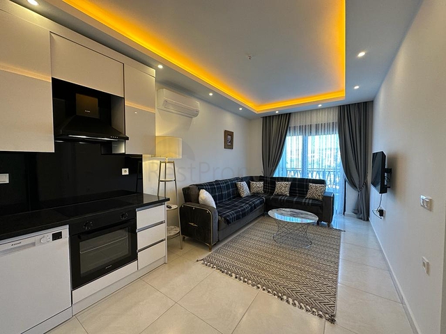 شقة 1+1 مطلة على الجبل في مجمع حديث