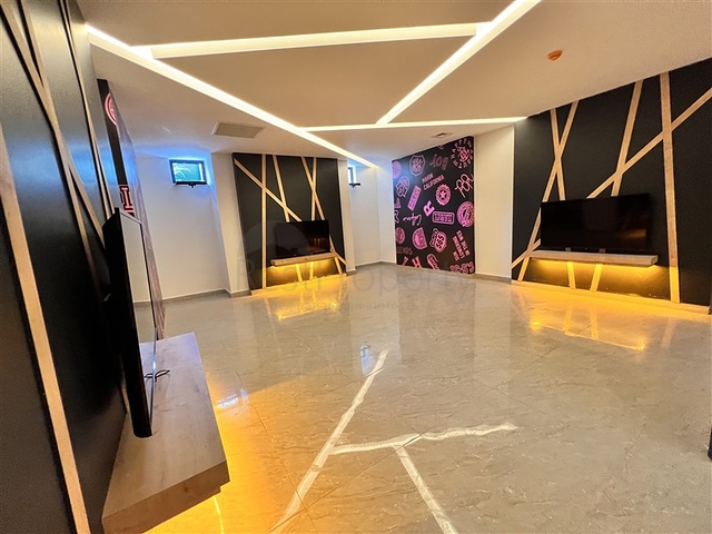 شقة 1+1 مطلة على الجبل في مجمع حديث