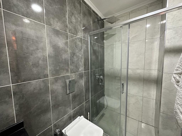 شقة 1+1 مطلة على الجبل في مجمع حديث