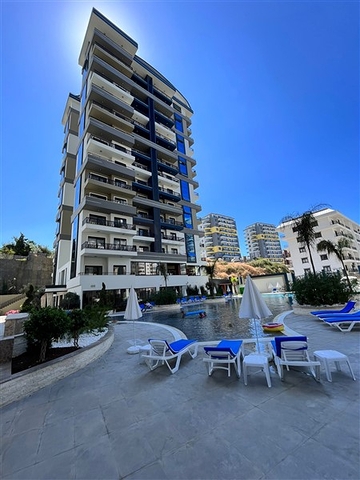 شقة 1+1 مطلة على الجبل في مجمع حديث