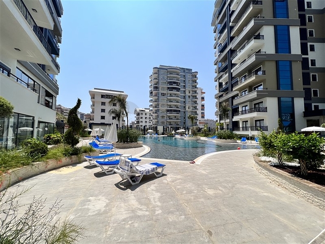 شقة 1+1 مطلة على الجبل في مجمع حديث