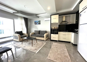 شقة 1+1 على مسافة قريبة من البحر 