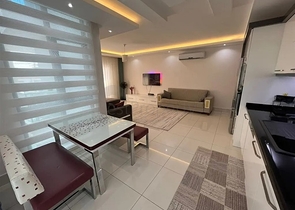 2 + 1 شقة 400 متر من البحر في منطقة توسمور   2 + 1 شقة 400 متر من البحر في منطقة توسمور