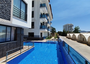 شقة جديدة أنيقة 1+1 في منطقة محمودلار شقة جديدة أنيقة 1+1 في منطقة محمودلار