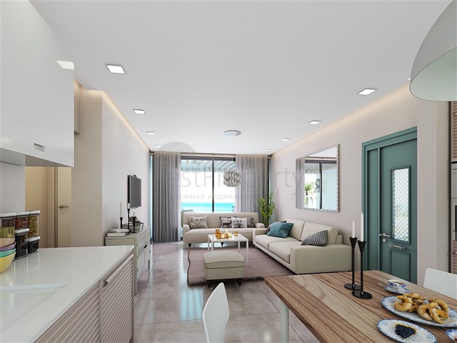 شقة 2+1 مع تراس خاص بها على بعد 100 متر من البحر