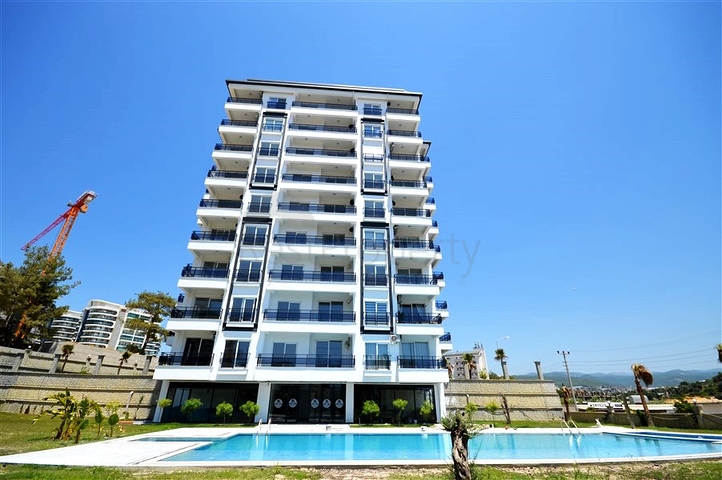 شقة مفروشة بغرفة نوم واحدة مع تخطيط 1 + 1