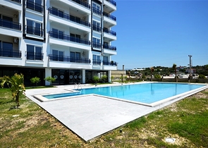 شقة مفروشة بغرفة نوم واحدة مع تخطيط 1 + 1