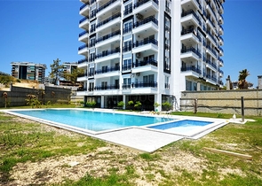 شقة مفروشة بغرفة نوم واحدة مع تخطيط 1 + 1