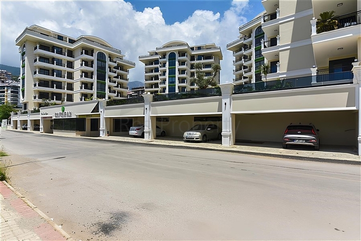 شقة مشرقة وواسعة في مجمع سكني حديث في منطقة أوبا