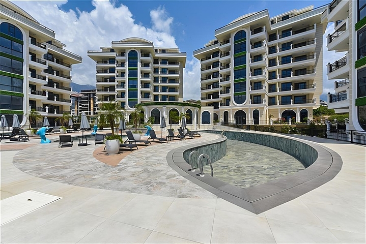 شقة مشرقة وواسعة في مجمع سكني حديث في منطقة أوبا