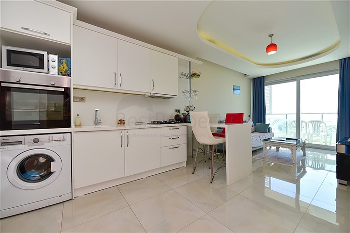 شقة 1+1 في منطقة محمودلار مطلة على البحر