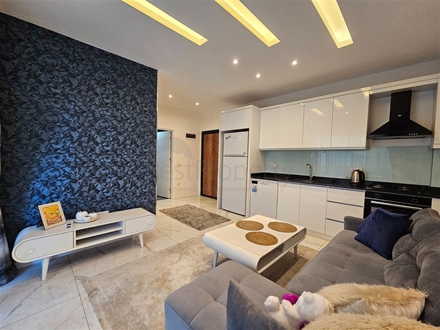 شقة جديدة للبيع في مركز الانيا - تصميم 1+1 - مفروشة - الانيا 