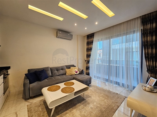 شقة جديدة للبيع في مركز الانيا - تصميم 1+1 - مفروشة - الانيا 