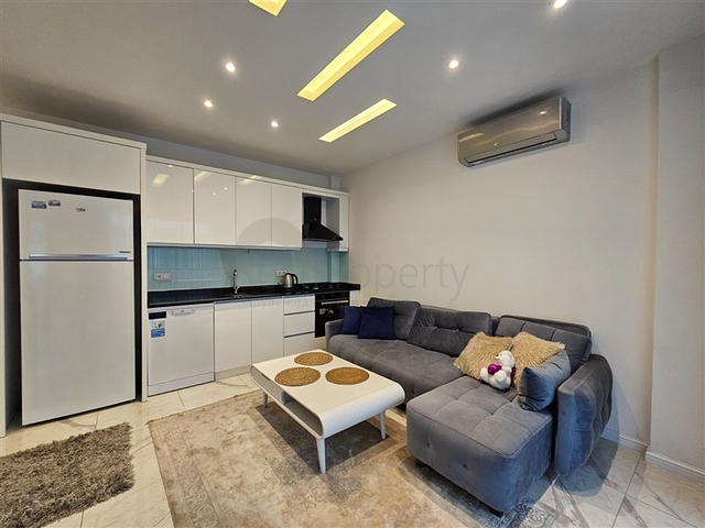 شقة جديدة للبيع في مركز الانيا - تصميم 1+1 - مفروشة - الانيا 