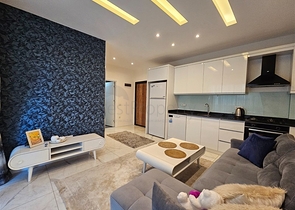 شقة جديدة للبيع في مركز الانيا - تصميم 1+1 - مفروشة - الانيا 