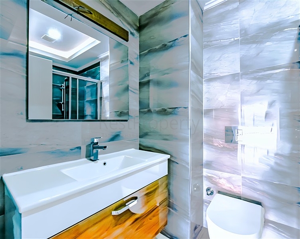 ضمن مجمع سكني حديث - شقة غرفة وصالة - مفروشة - في مهموتلار / الانيا 