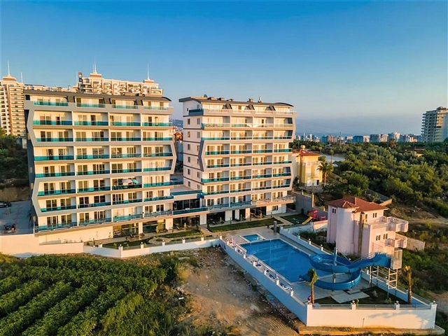 مجمع سكني حديث  - شقة غرفة وصالة - في محمودلار / الانيا 