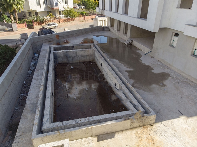 شقق 2 + 1 ، 3 + 1 في منطقة اونجالي في كونيالتي أنطاليا