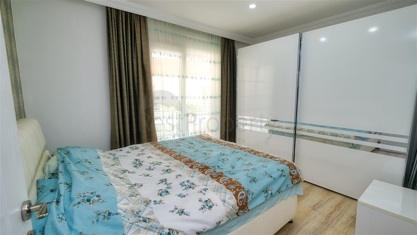 شقة في مجمع غني بالبنية التحتية في منطقة كونيالتي - أنطاليا.