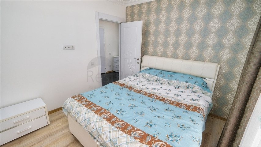 شقة في مجمع غني بالبنية التحتية في منطقة كونيالتي - أنطاليا.