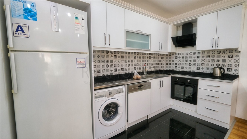 شقة في مجمع غني بالبنية التحتية في منطقة كونيالتي - أنطاليا.