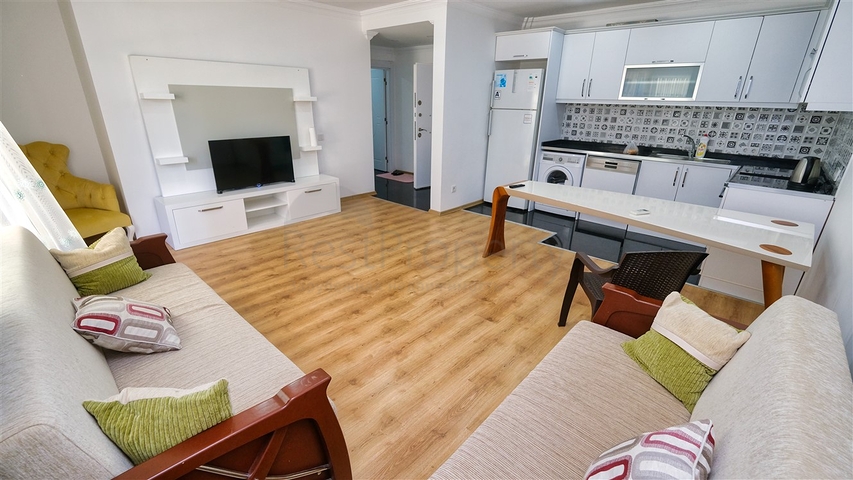 شقة في مجمع غني بالبنية التحتية في منطقة كونيالتي - أنطاليا.