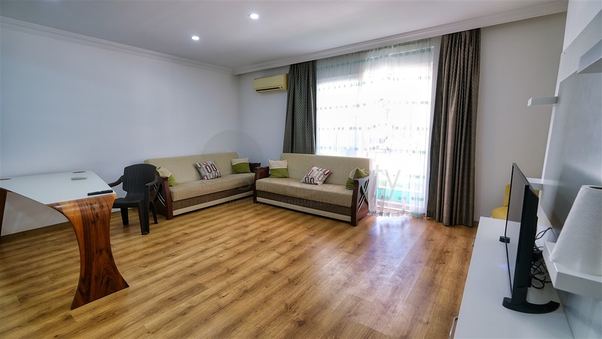 شقة في مجمع غني بالبنية التحتية في منطقة كونيالتي - أنطاليا.