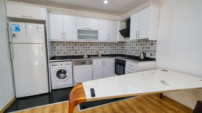 شقة في مجمع غني بالبنية التحتية في منطقة كونيالتي - أنطاليا.