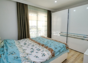 شقة في مجمع غني بالبنية التحتية في منطقة كونيالتي - أنطاليا.