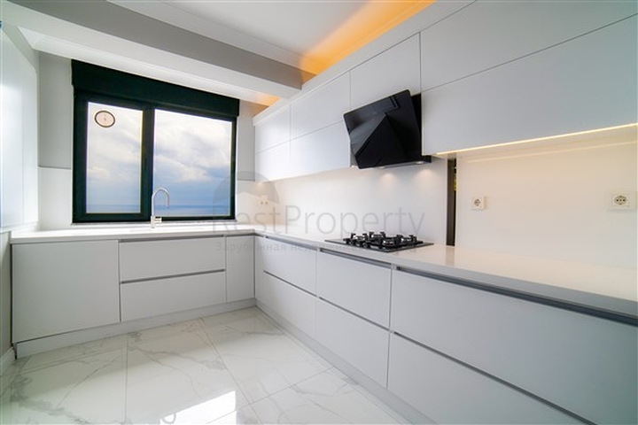 شقة بإطلالة رائعة على البحر في منطقة تشاغلايان الصغيرة - أنطاليا