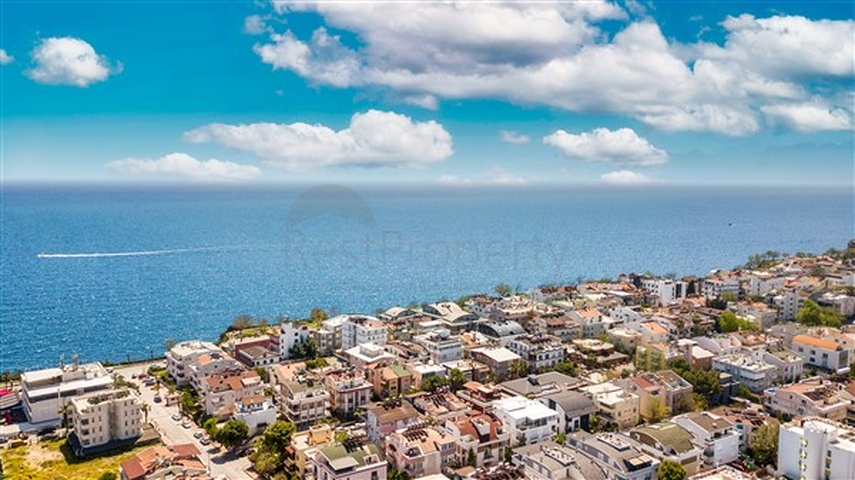 شقة بإطلالة رائعة على البحر في منطقة تشاغلايان الصغيرة - أنطاليا