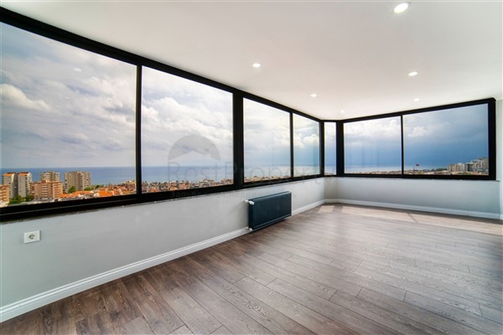 شقة بإطلالة رائعة على البحر في منطقة تشاغلايان الصغيرة - أنطاليا