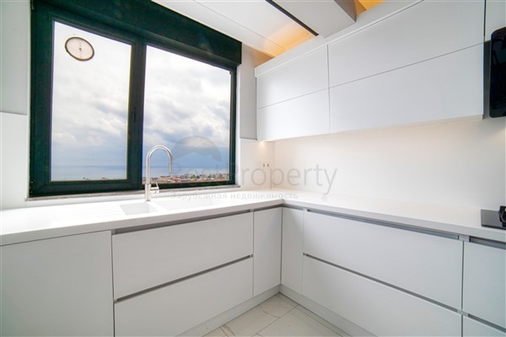 شقة بإطلالة رائعة على البحر في منطقة تشاغلايان الصغيرة - أنطاليا