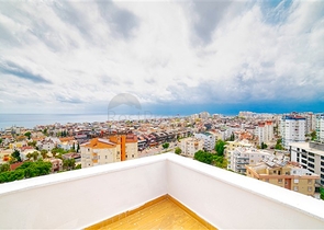 شقة بإطلالة رائعة على البحر في منطقة تشاغلايان الصغيرة - أنطاليا